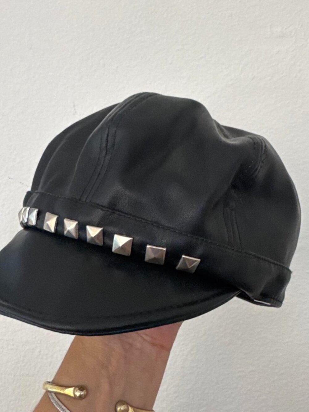 Black PU leather cap with silver studs, size 8